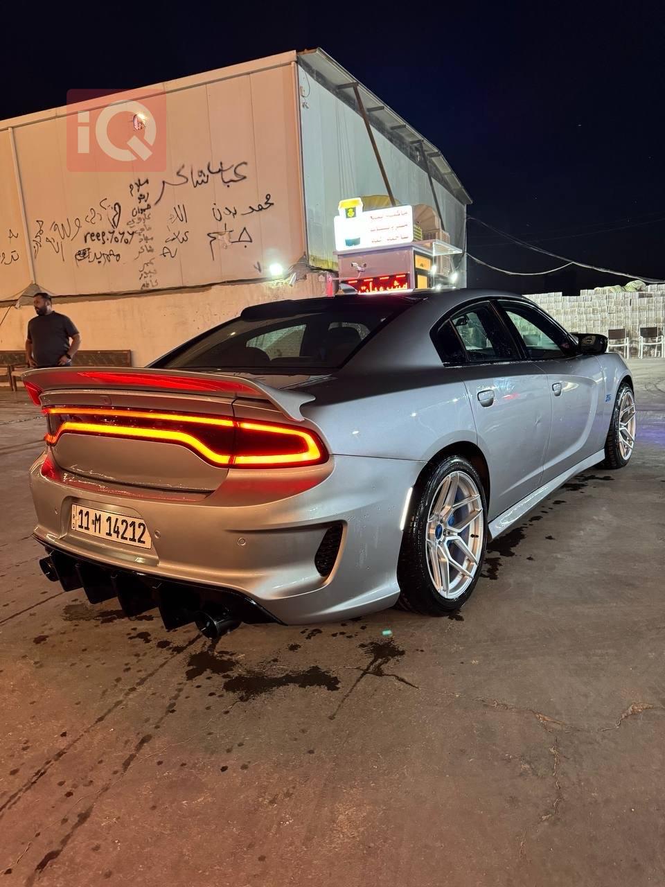 دۆج چارجەر